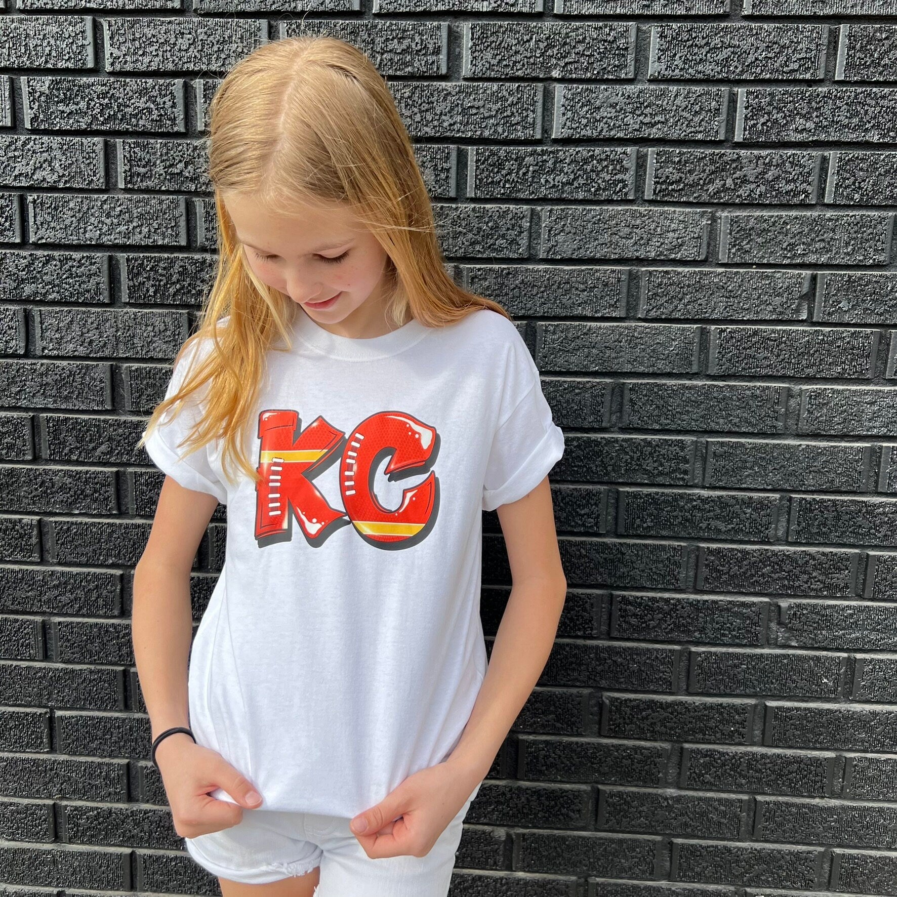 Graffiti KC | Made in Kansas City! | Toddler Kids Football at Arrowhead White Long Short Sleeve Shirt | Perfect for Game Day | Soft! | Youth