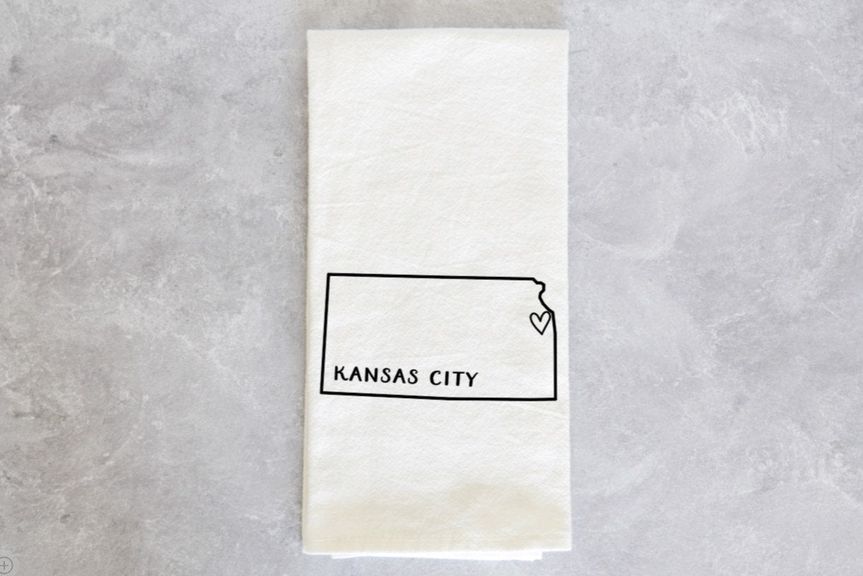 a white towel with kansas drawn on it