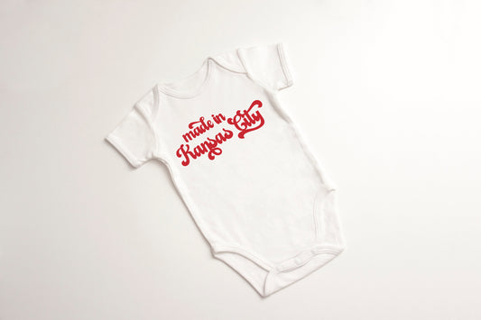 White Onesie with made in Kansas City in retro font in red